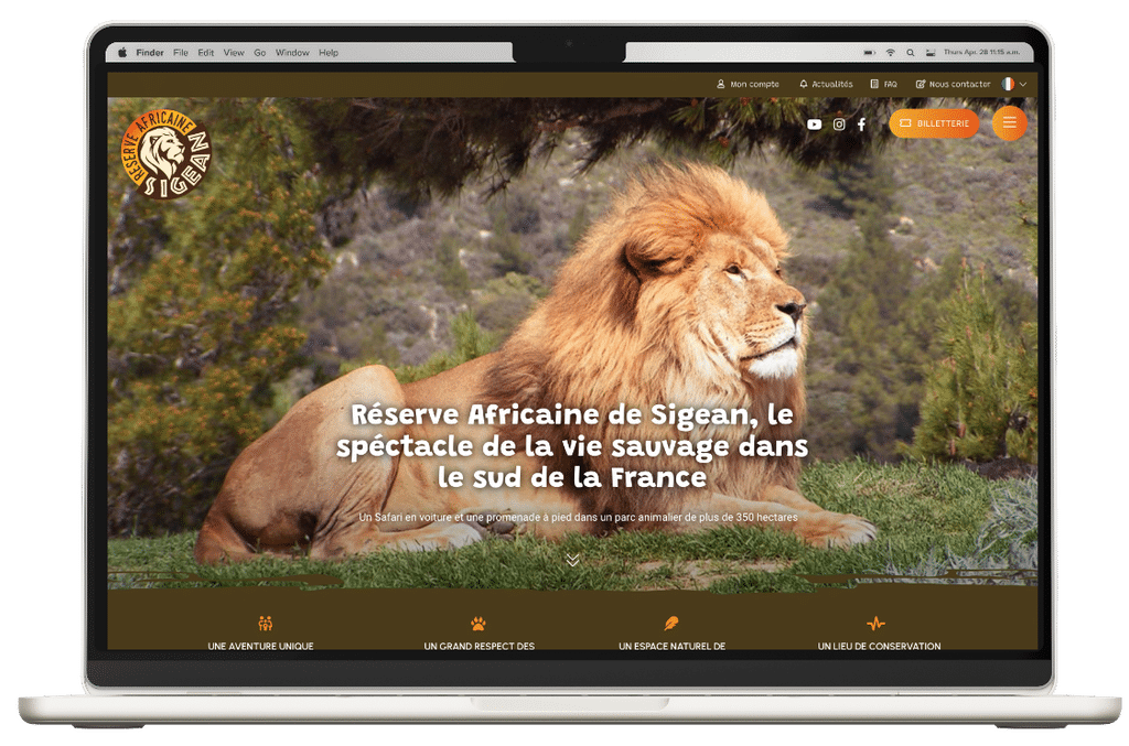 Un site vitrine mettant en avant Réserve Africaine de Sigean sur un ordinateur portable ouvert.