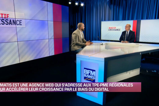 Deux hommes en plateau TV "BFM Business" discutent de la croissance digitale avec Nematis.